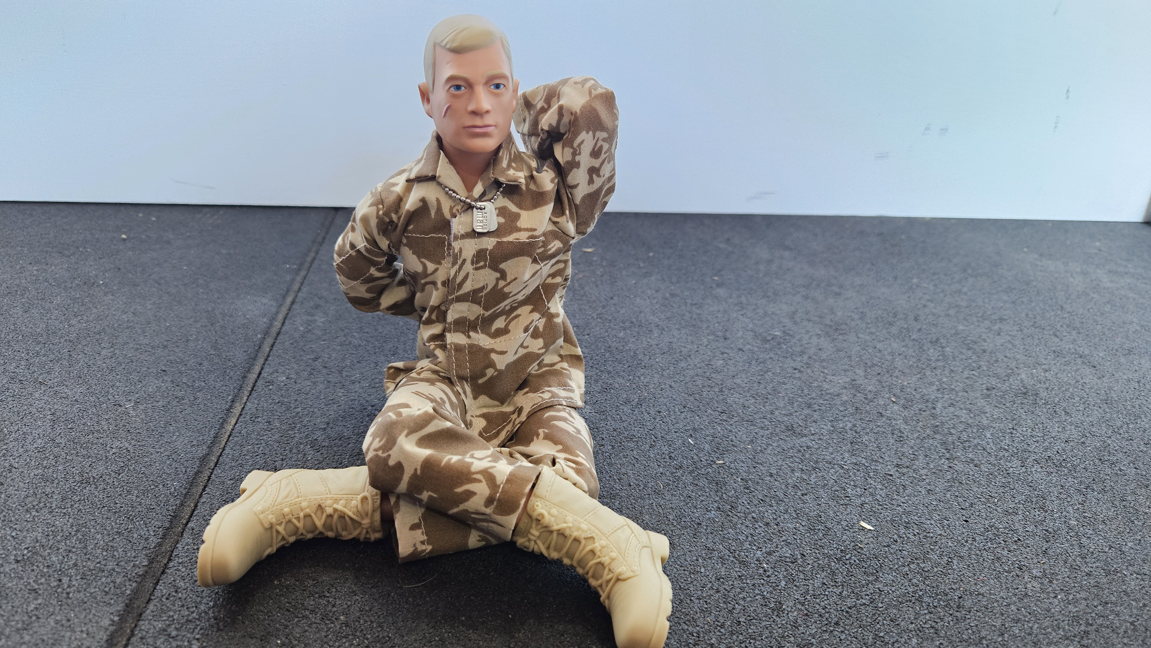 Action Man doing Cow Face Pose